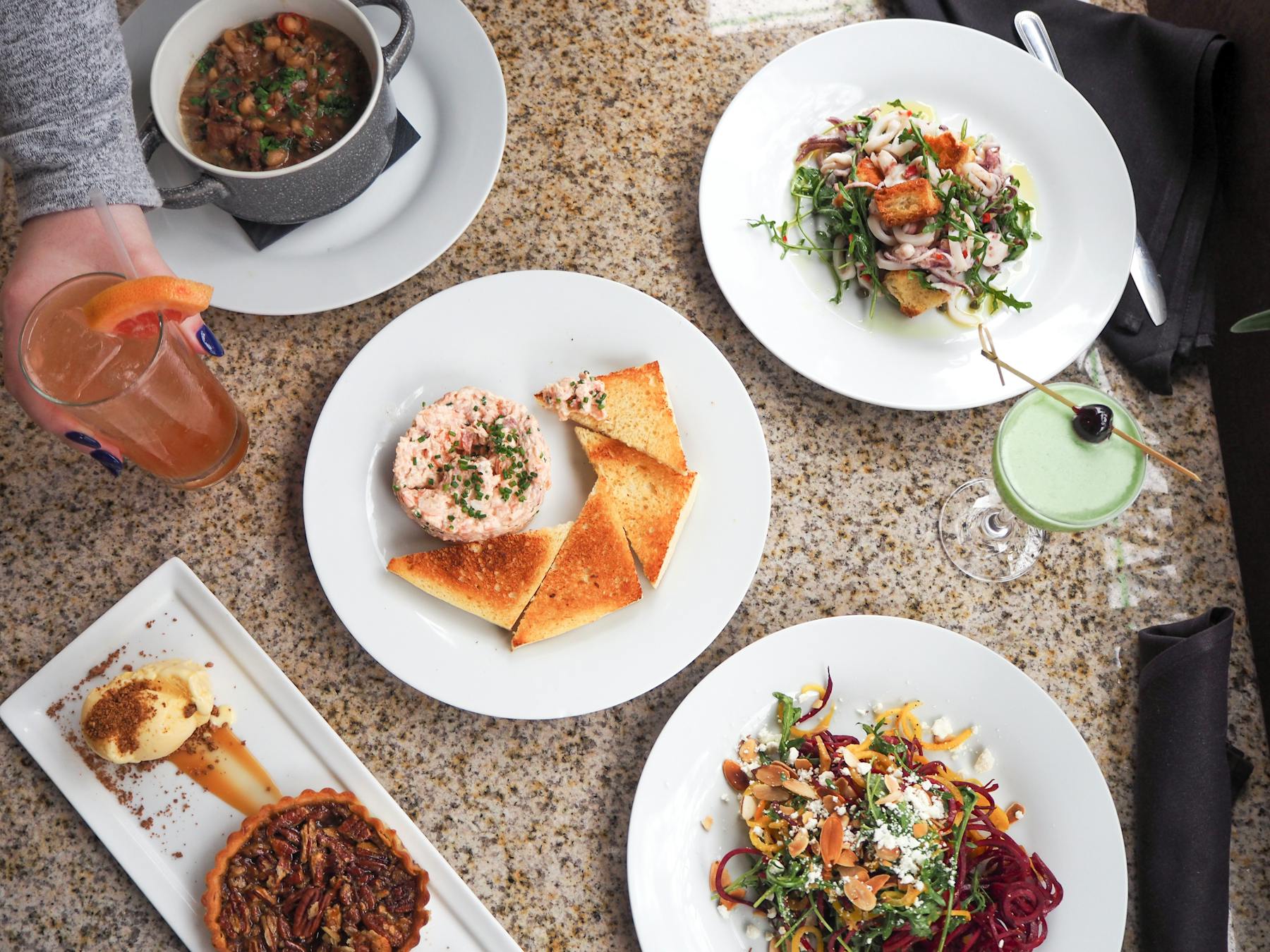 a bowl filled with different types of food on a plate