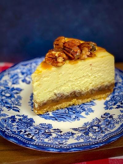 a piece of cake sitting on top of a blue plate
