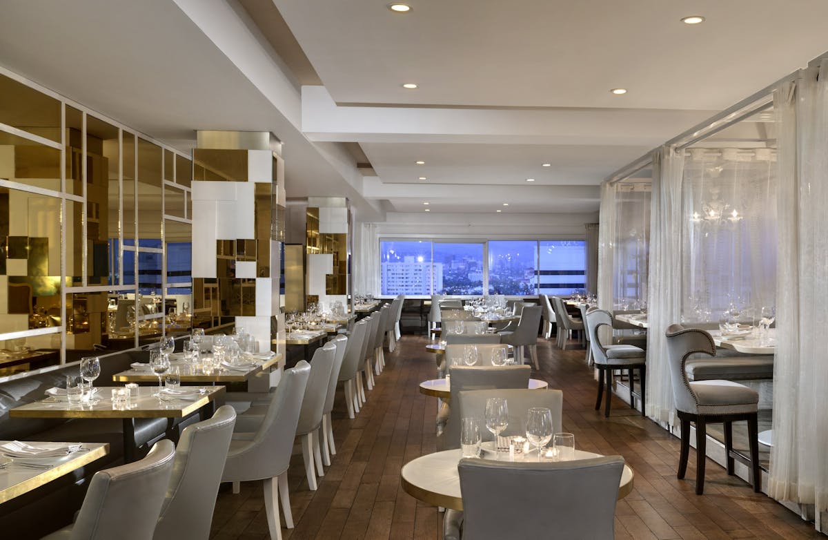 private dining space in The Penthouse restaurant with tables and chairs