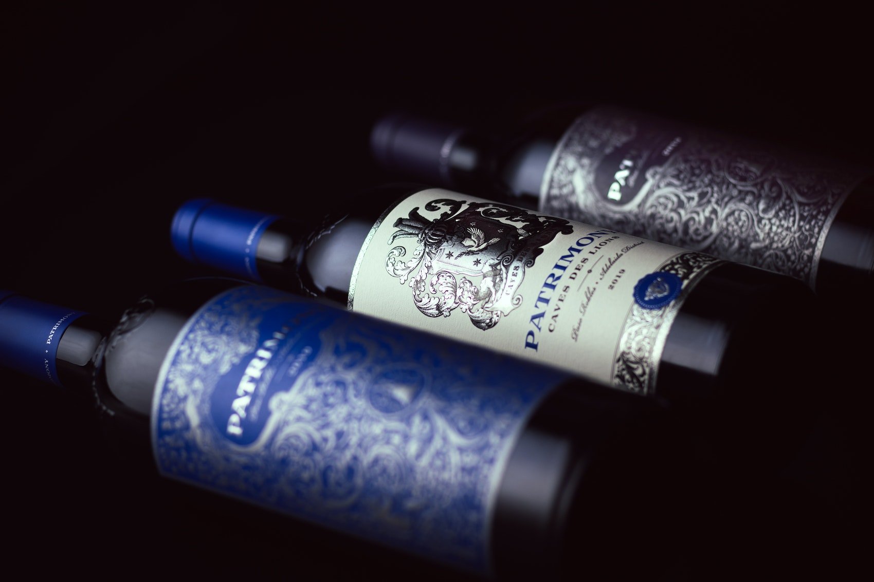 Three bottles of PATRIMONY Caves des Lions from the Adelaida District of Paso Robles