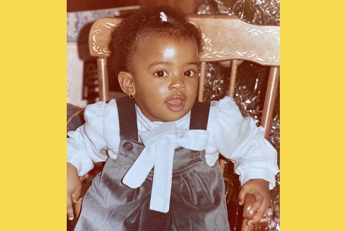 a little girl posing for a photo