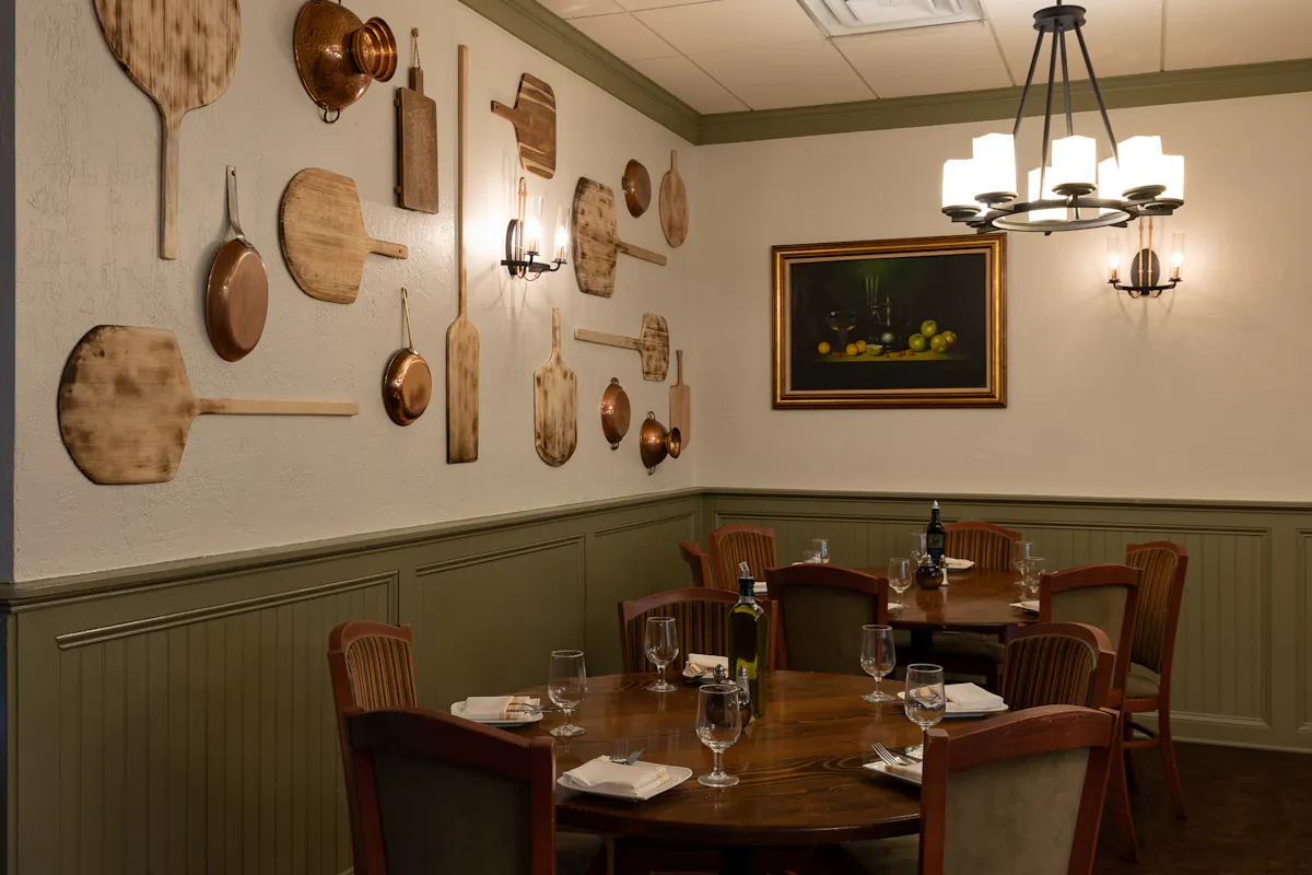 a room that has a clock on a table