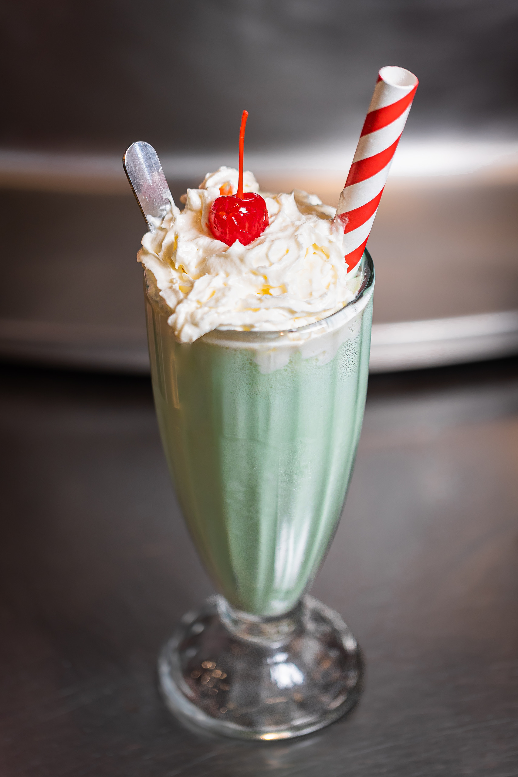 a glass cup on a table