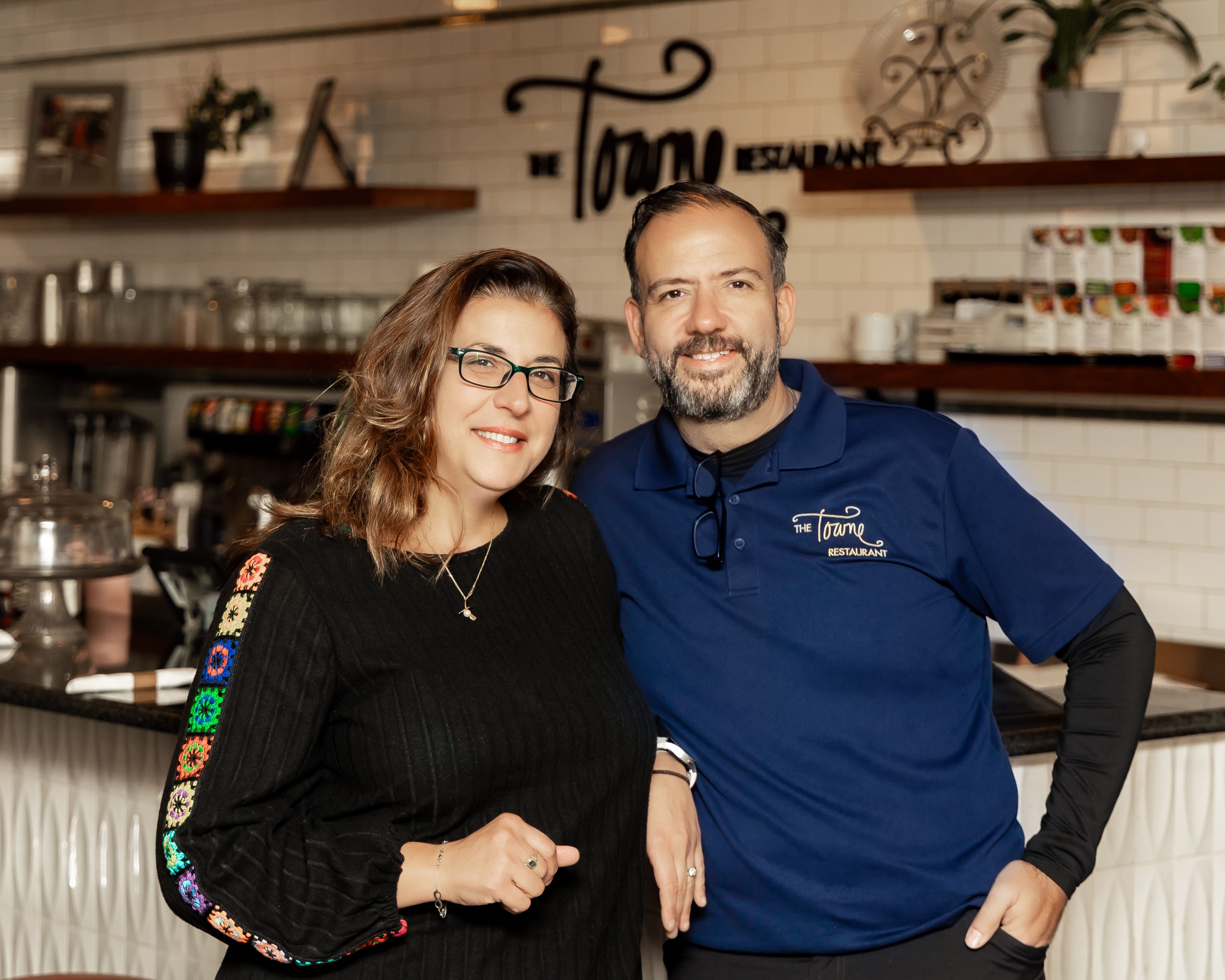 a man and a woman posing for a picture