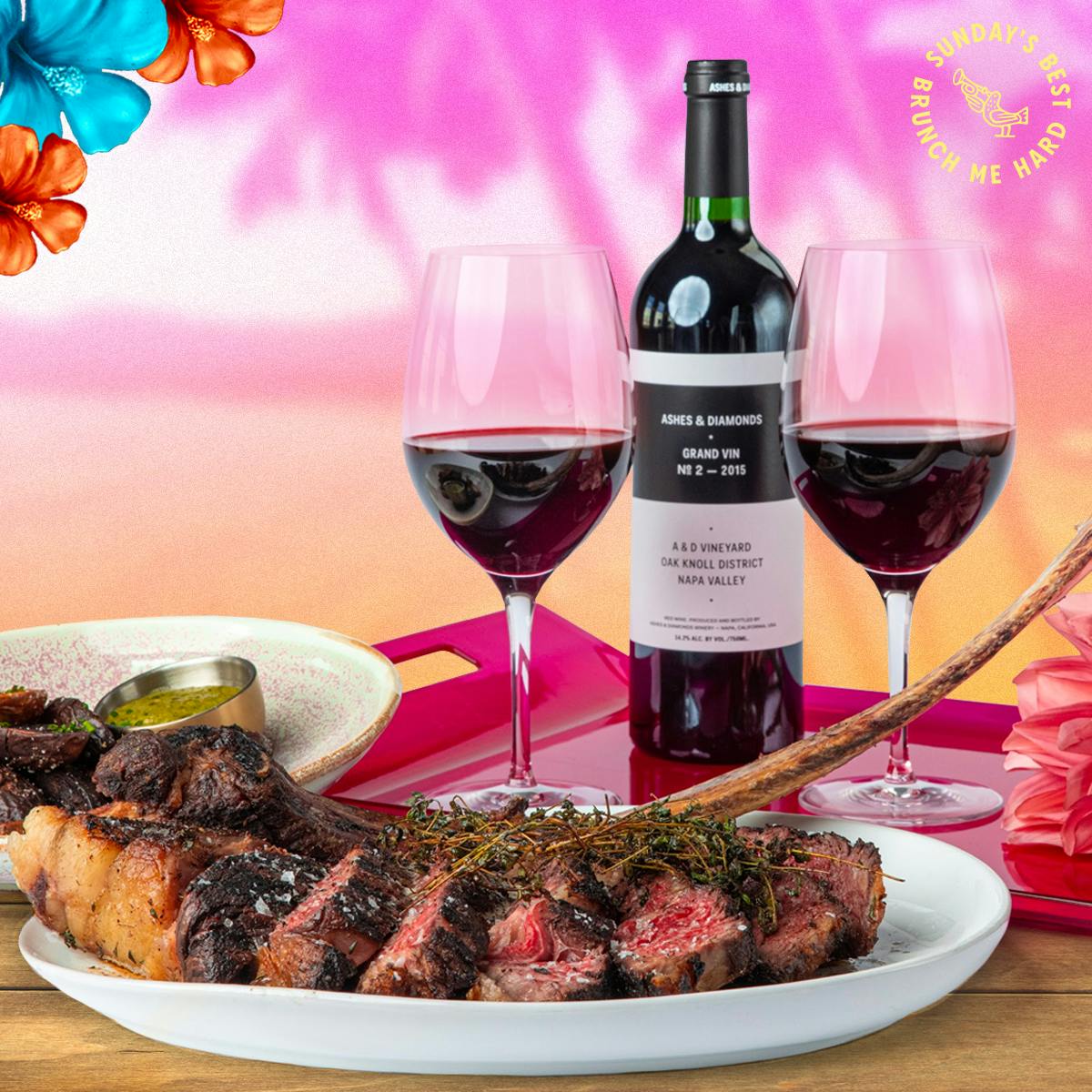 a close up of a plate of food and a bottle of wine