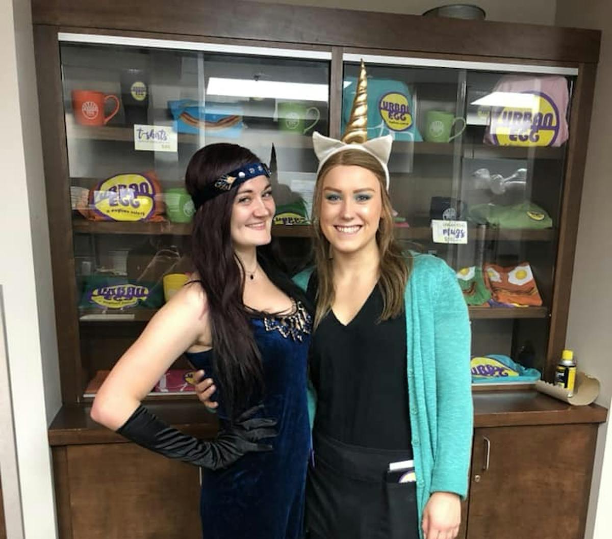 2 Staff Members Dressed in Halloween Costumes