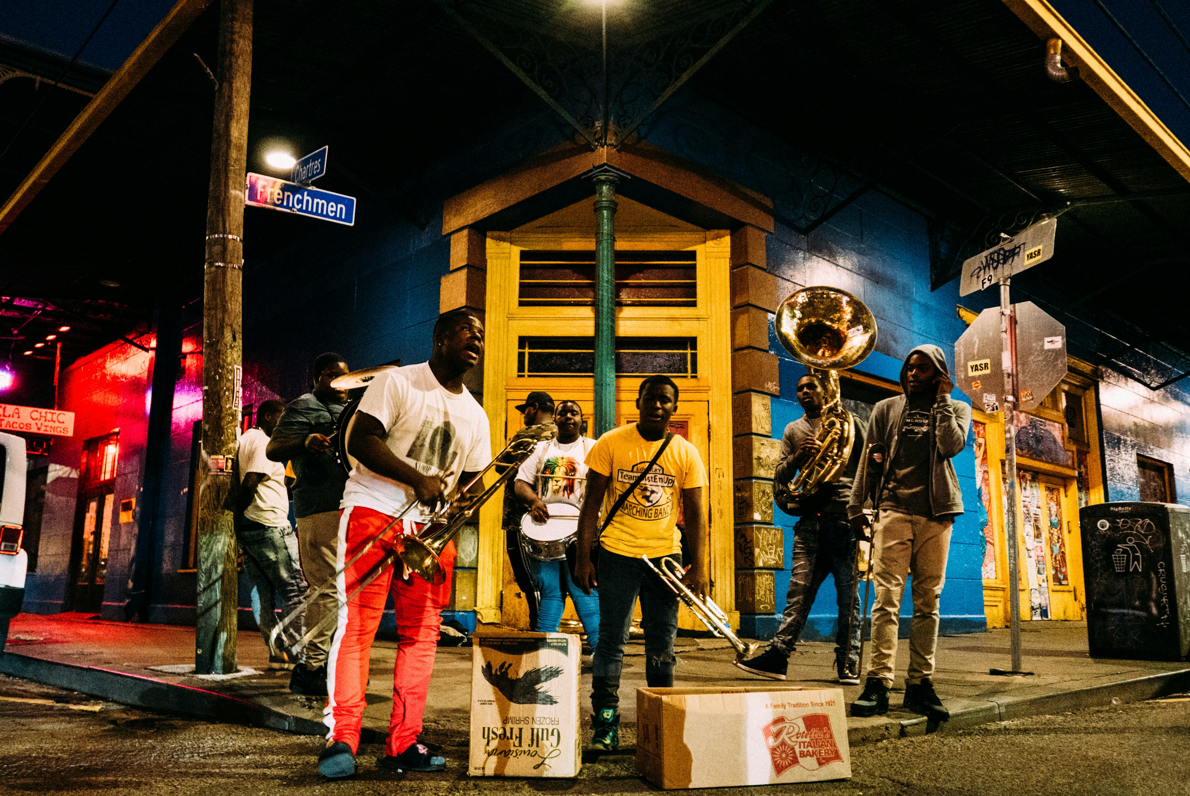 a group of people standing in front of a building