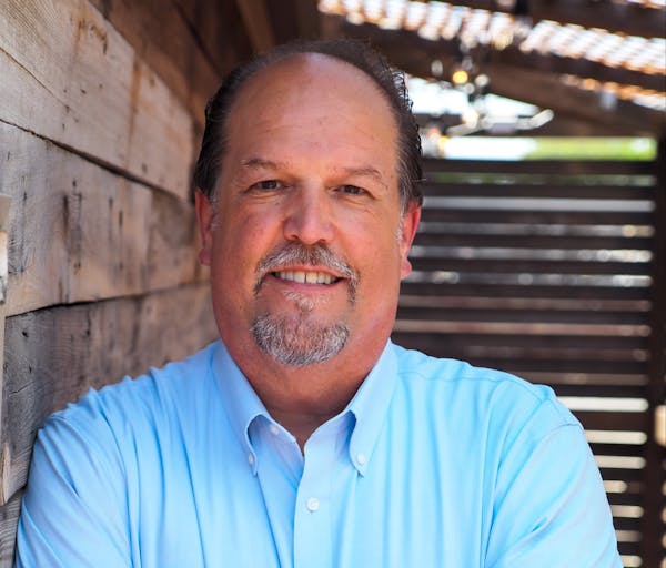 a man wearing a blue shirt