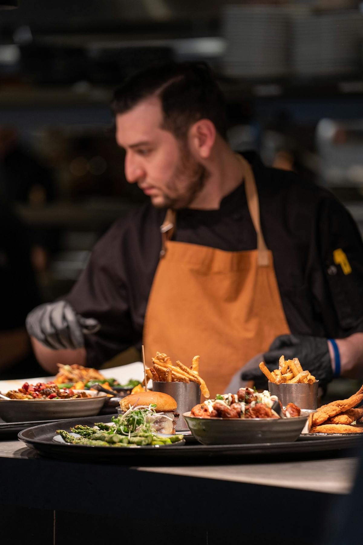 a person sitting at a table with a plate of food