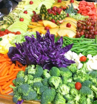 a close up of many different vegetables on display