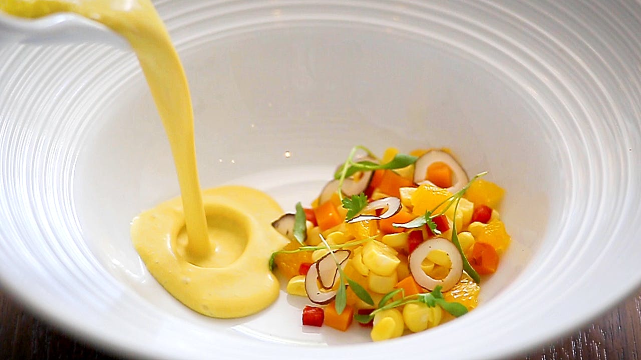 a bowl of fruit on a plate