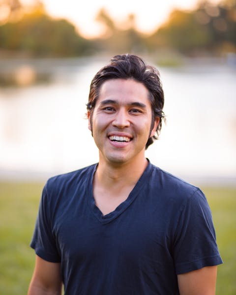 a man smiling for the camera