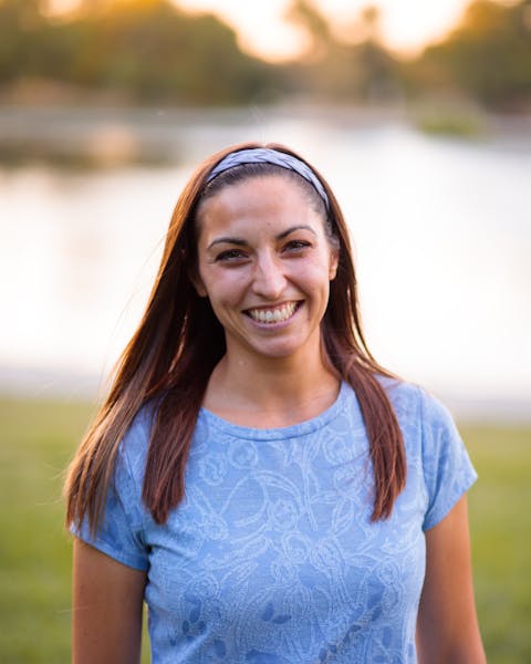 a woman smiling for the camera