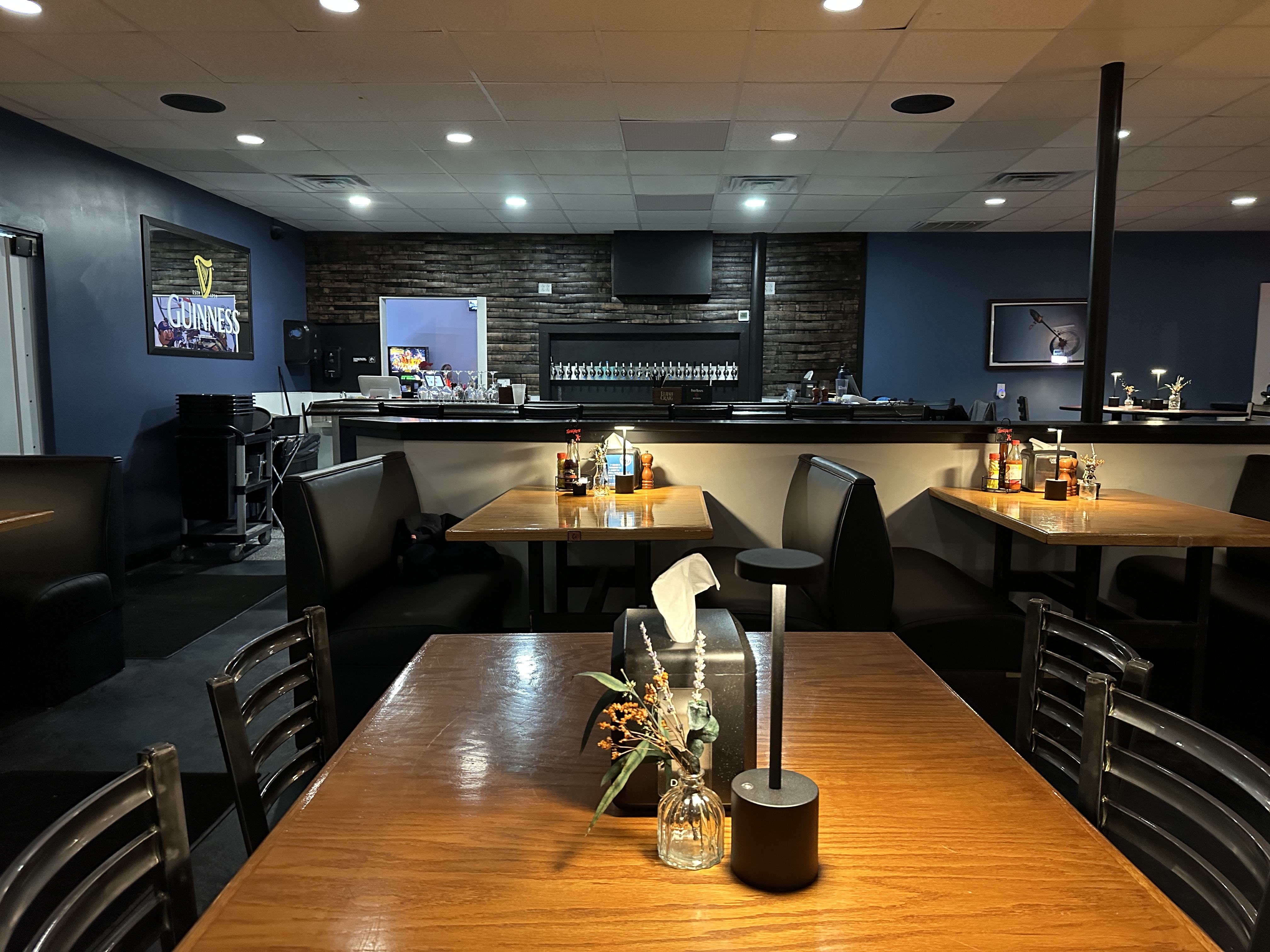 a modern kitchen with an island in the middle of a room