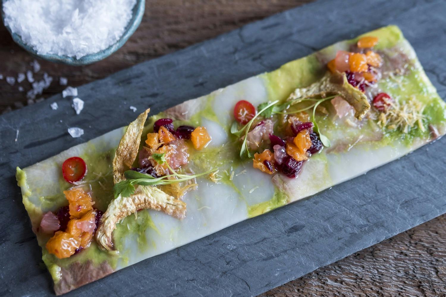 a plate of food with a slice cut out