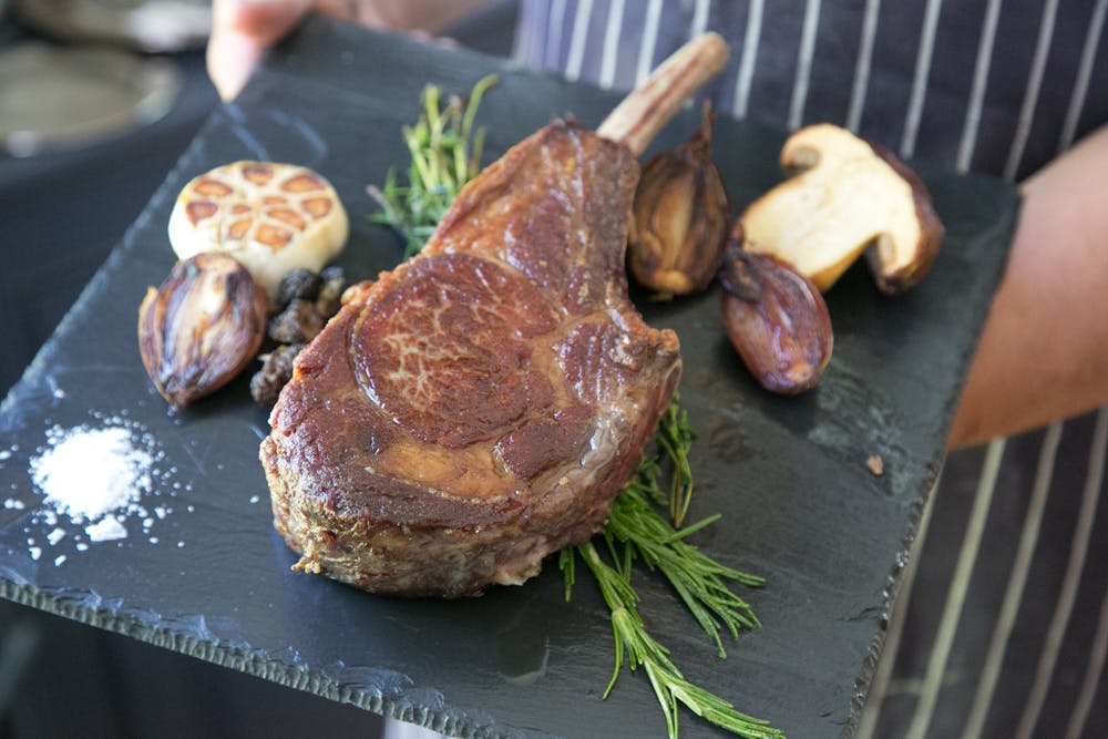 a plate of food on a grill