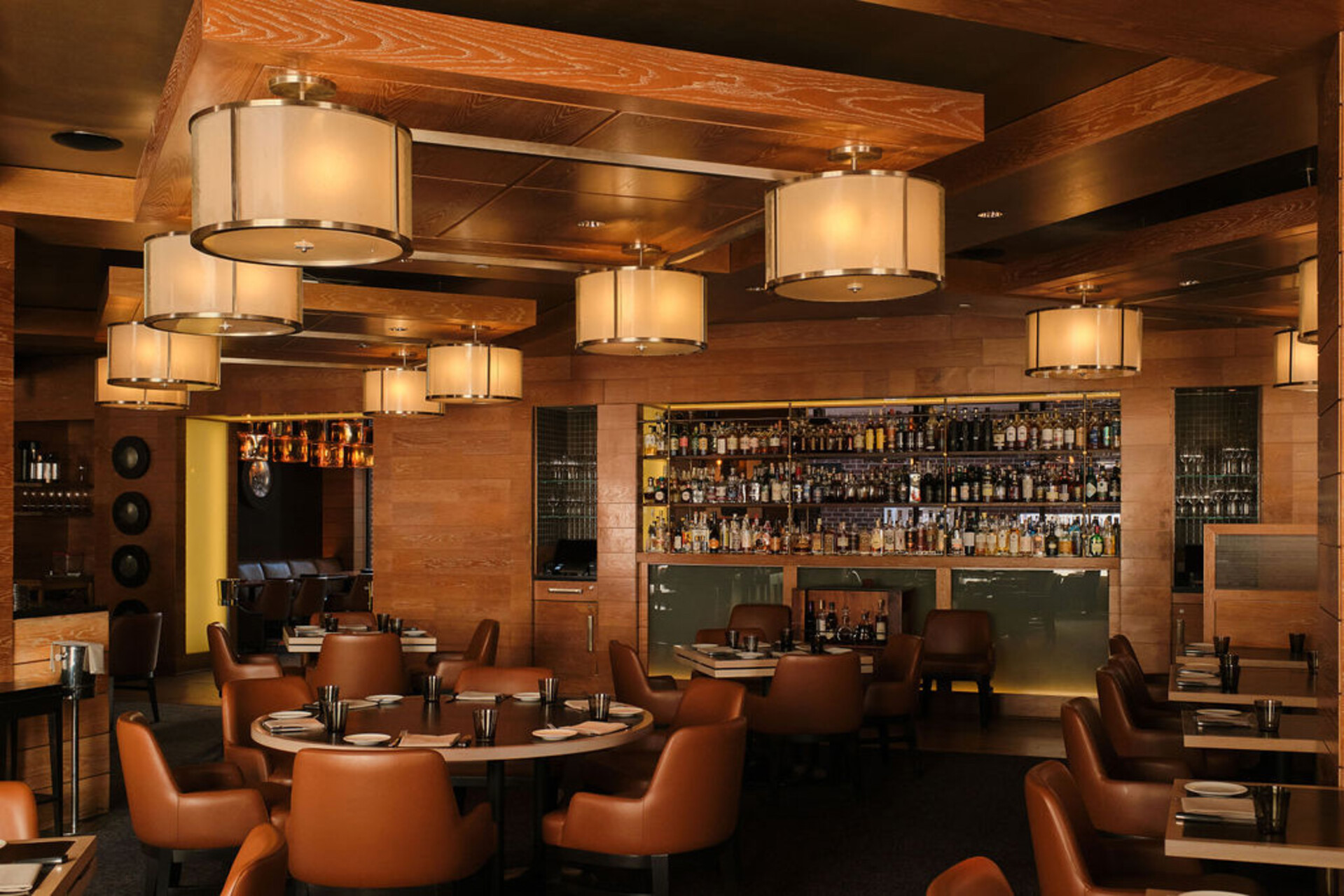 a restaurant with tables and chairs