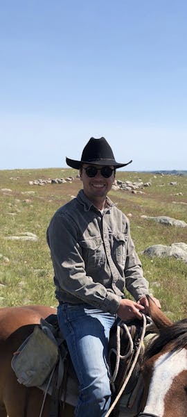 a man riding a horse