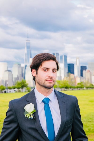 a man wearing a suit and tie