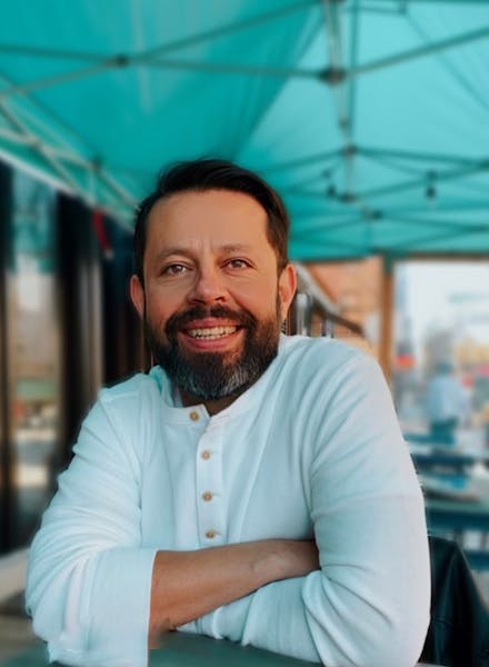 a man in a blue shirt