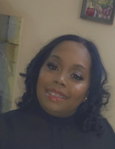 a woman smiling for the camera