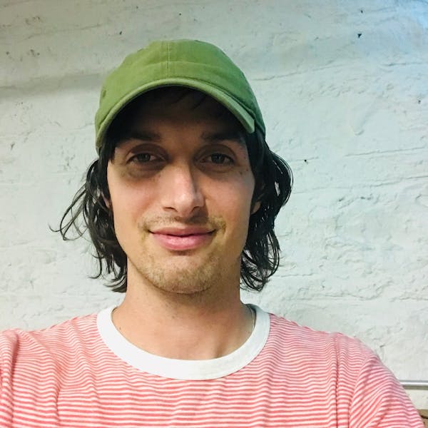 a person wearing a red hat