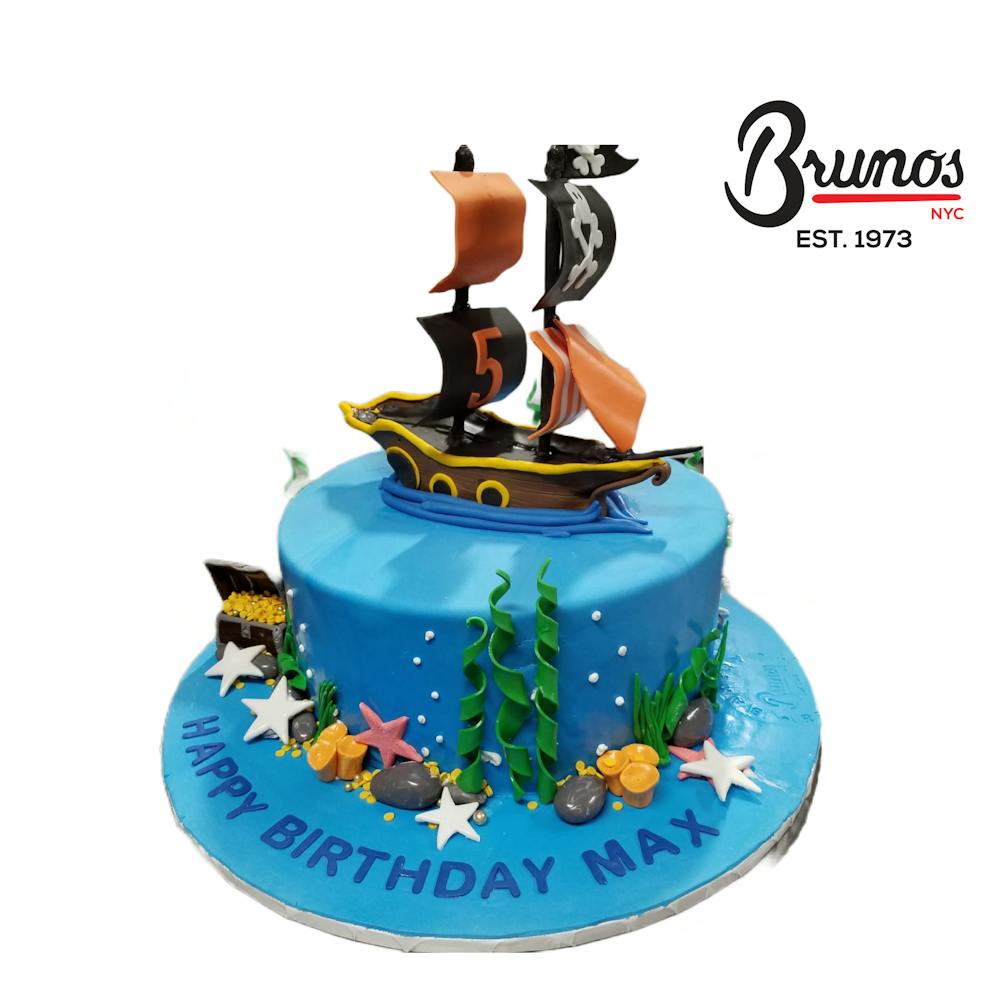 a blue cake is sitting on a table