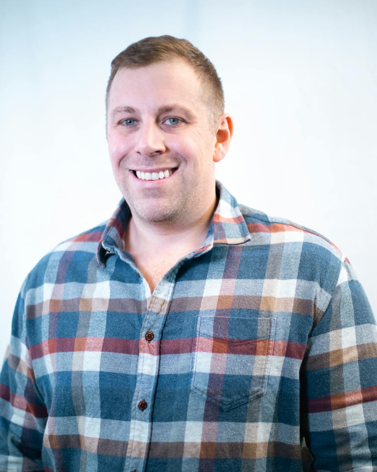 a man smiling for the camera