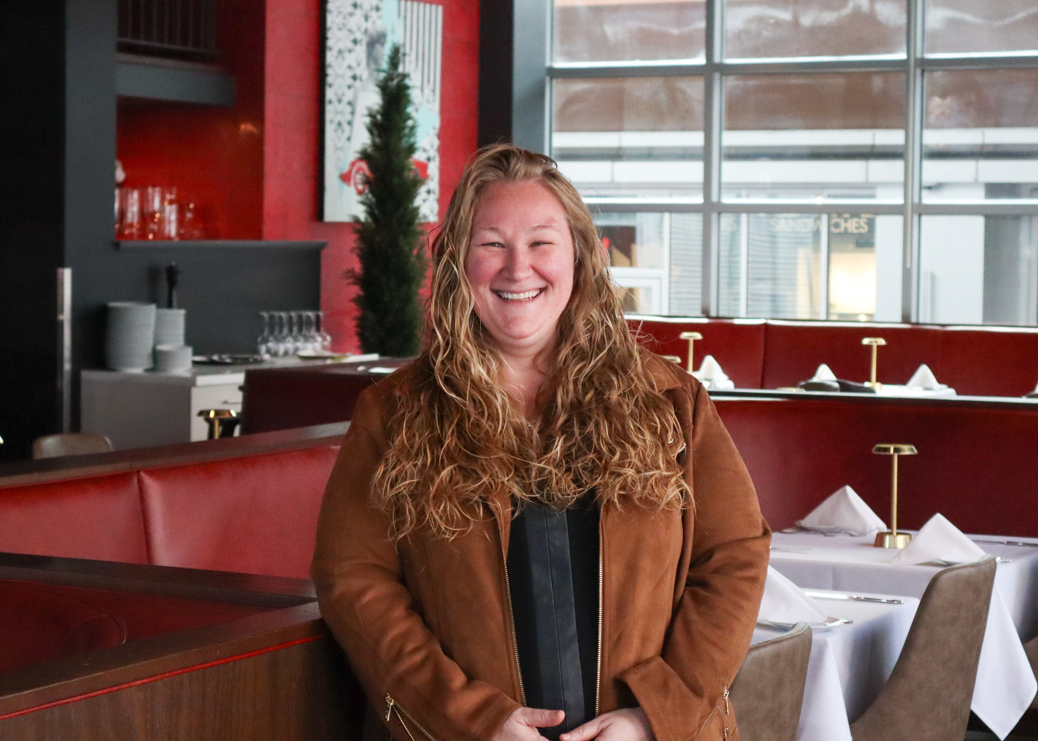 Professional headshot of a staff member at Forno Osteria & Bar.