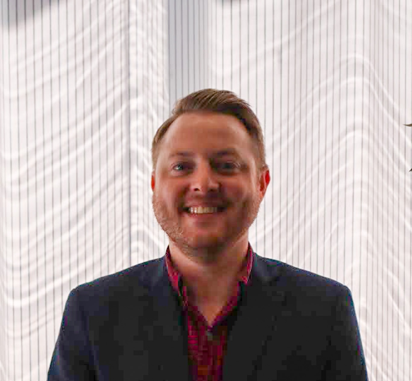 Professional headshot of a staff member at Forno Osteria & Bar.