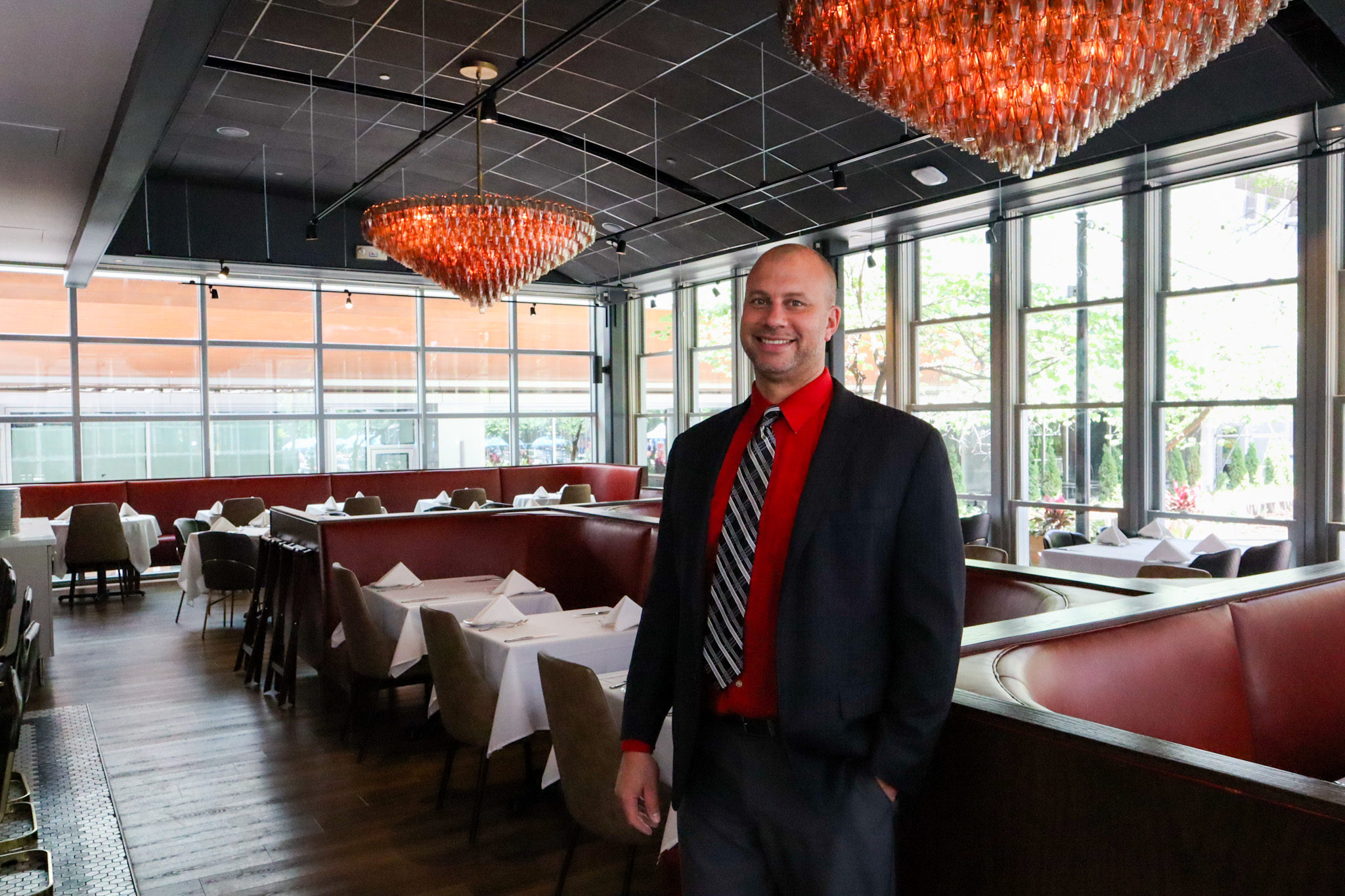 Professional headshot of a staff member at Forno Osteria & Bar.