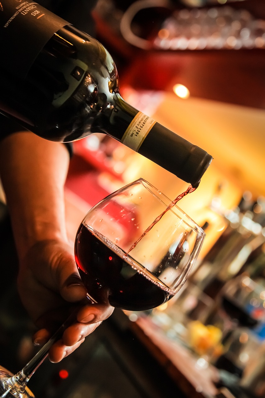 a person holding a wine glass