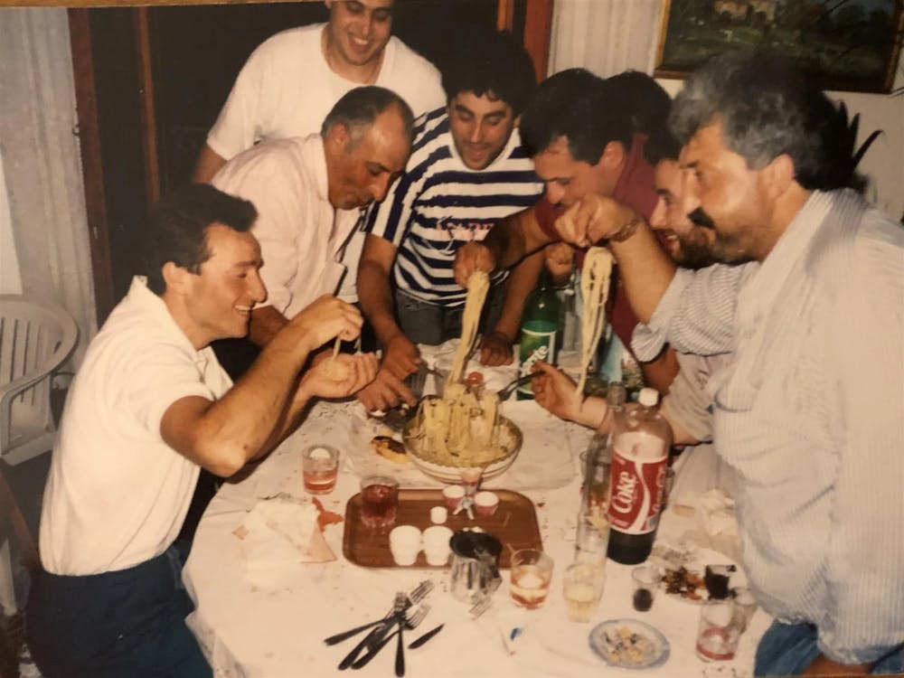 a group of people sitting at a table