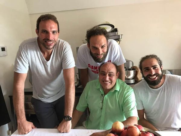 a group of people posing for the camera