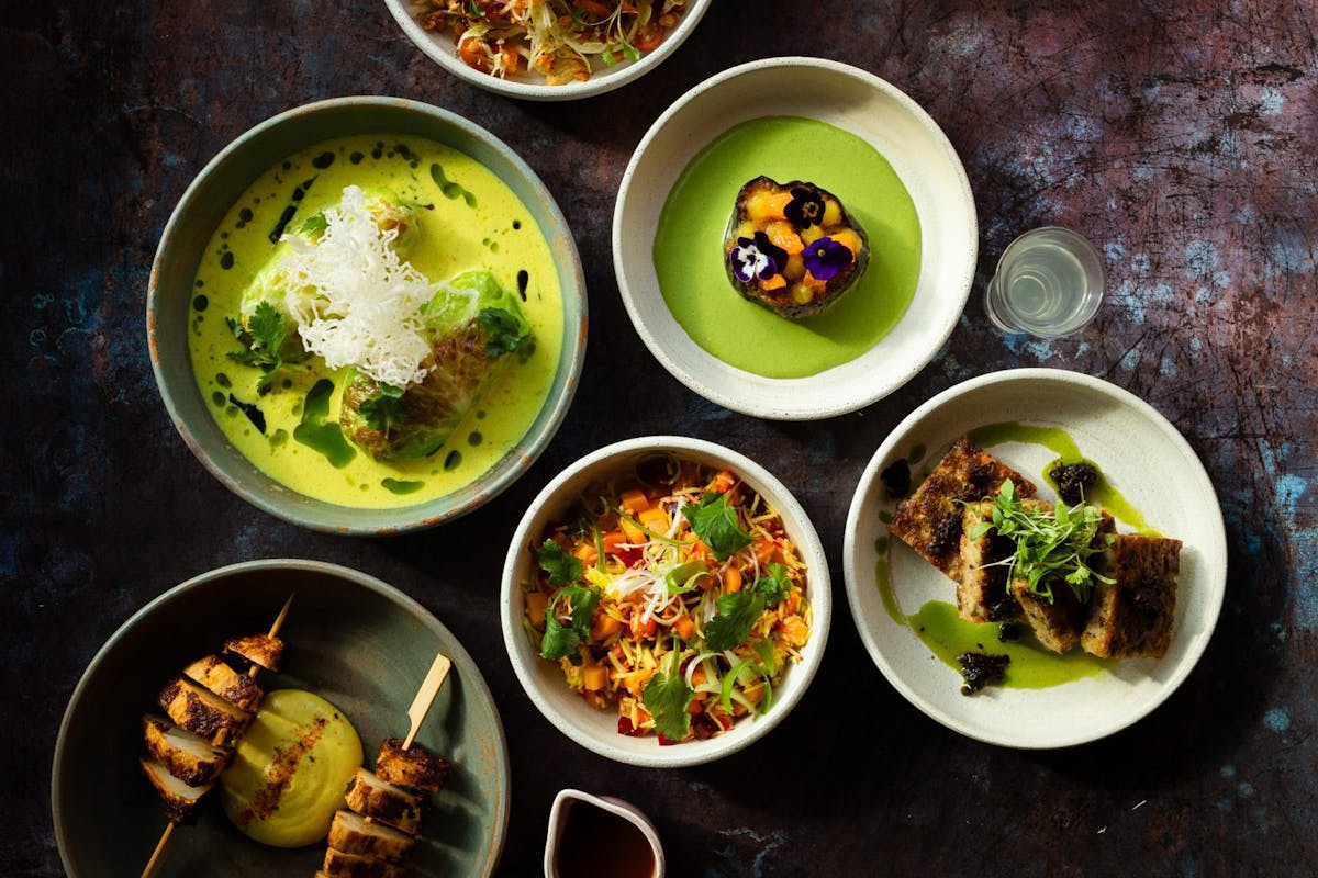 a bowl filled with different types of food on a table