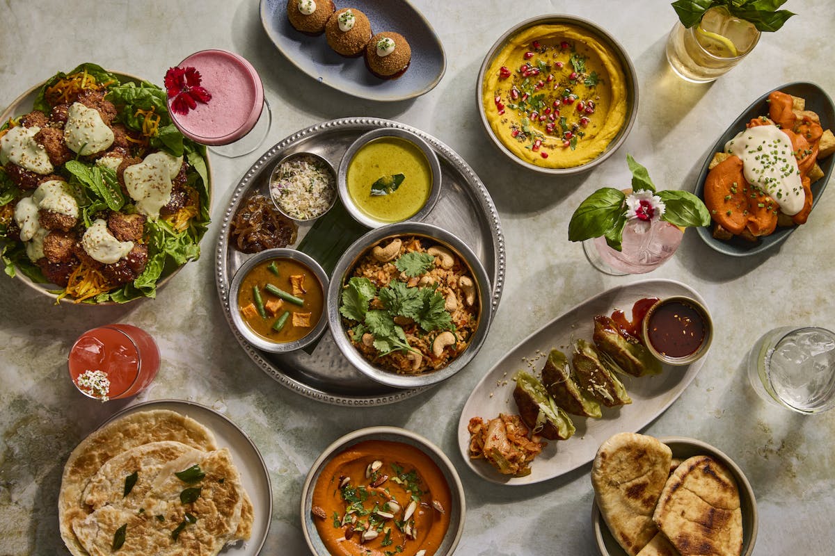 a bunch of different types of food on a table
