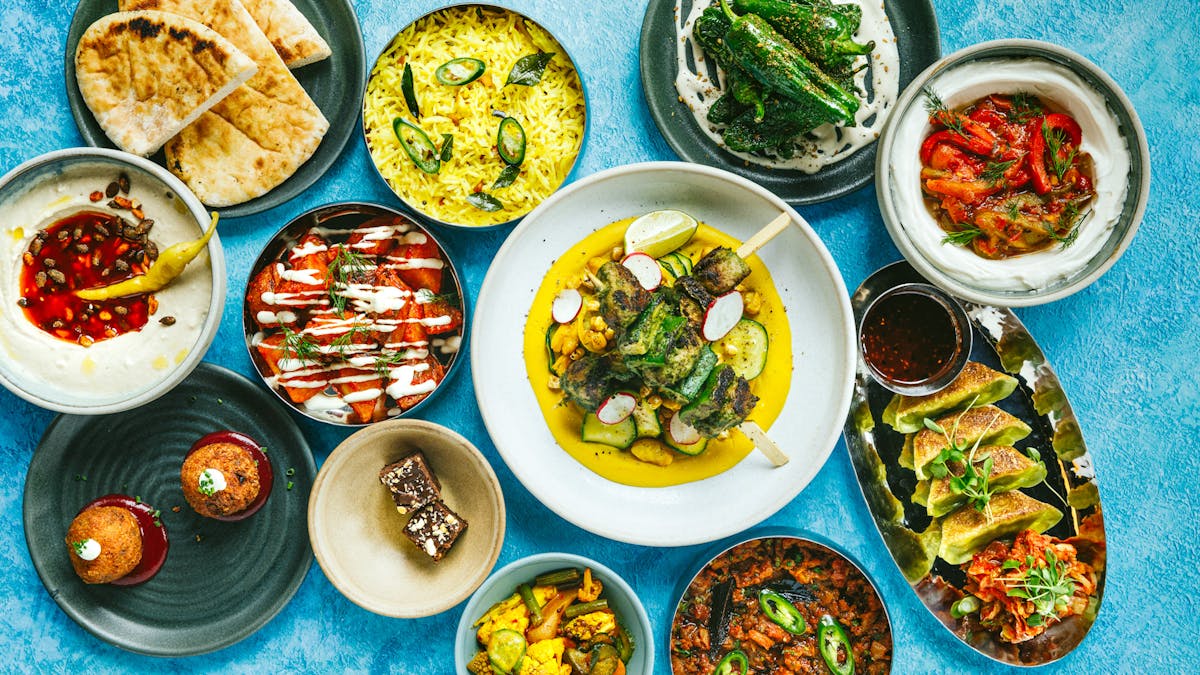 a bowl filled with different types of food on a table