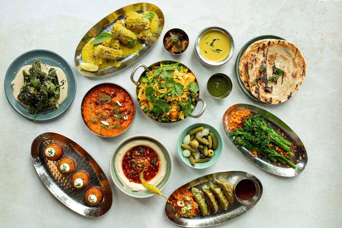a bunch of different types of food on a table