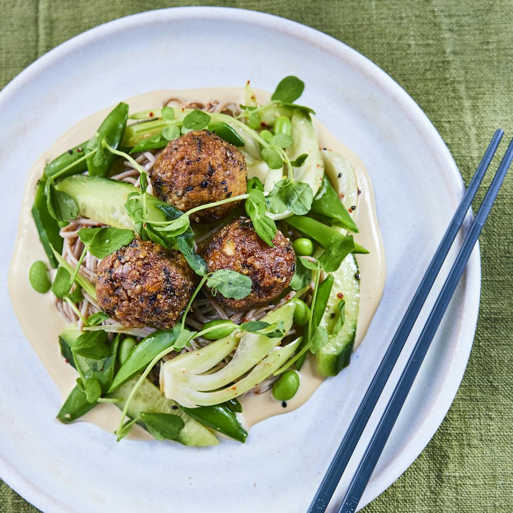 a bowl of salad on a plate