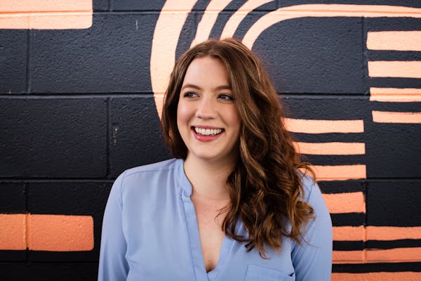 a person smiling for the camera
