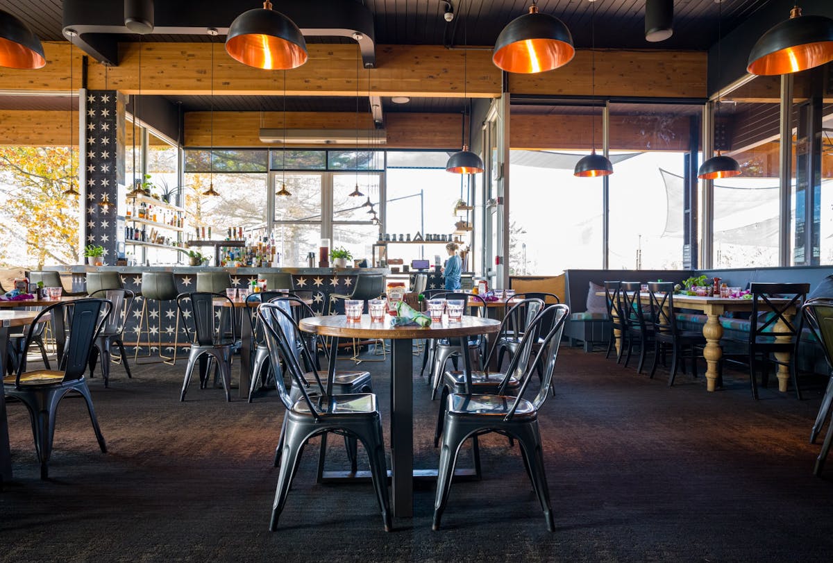 a dining room table in front of a building