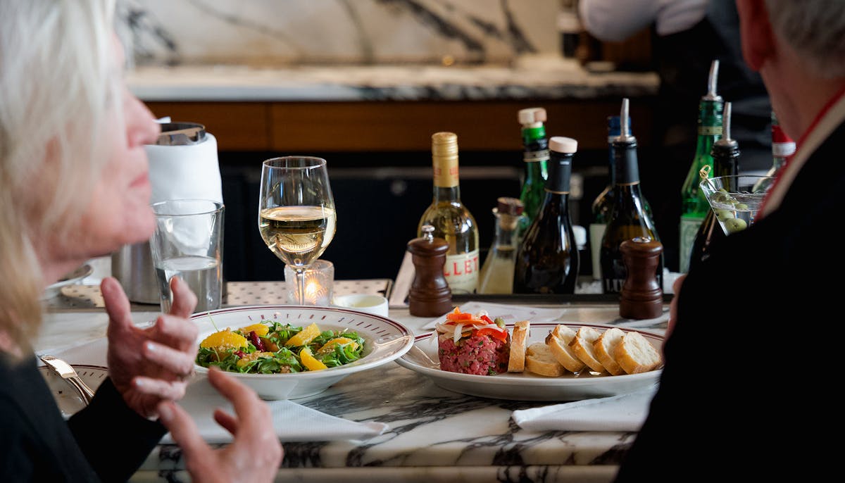 food & wine on a marble table