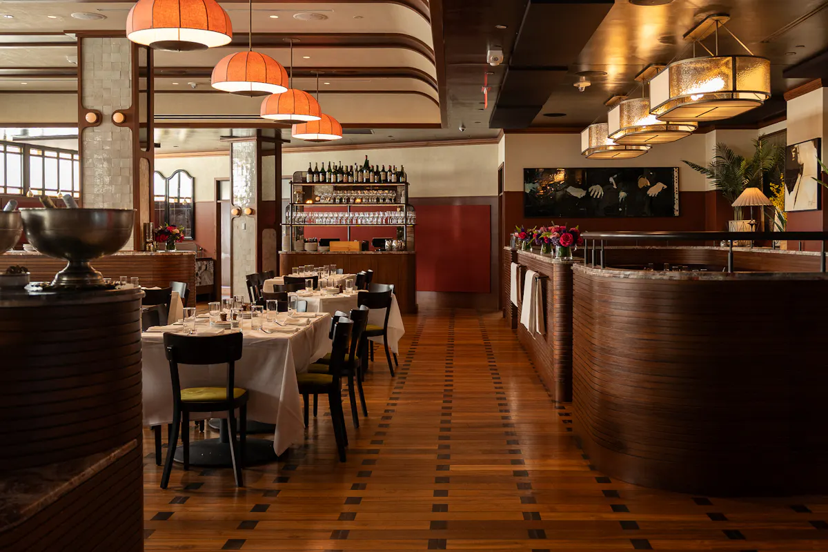 a restaurant with tables and chairs