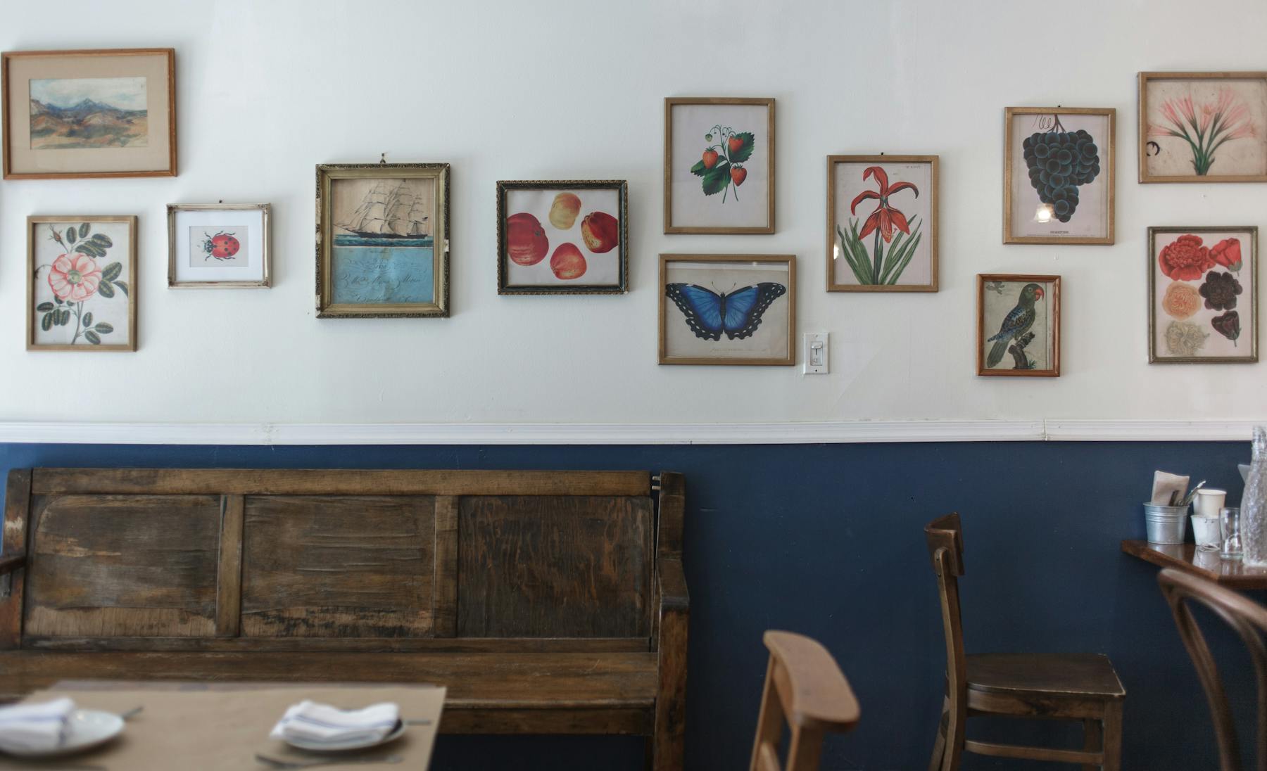 a painting in a living room filled with furniture and vase on a table