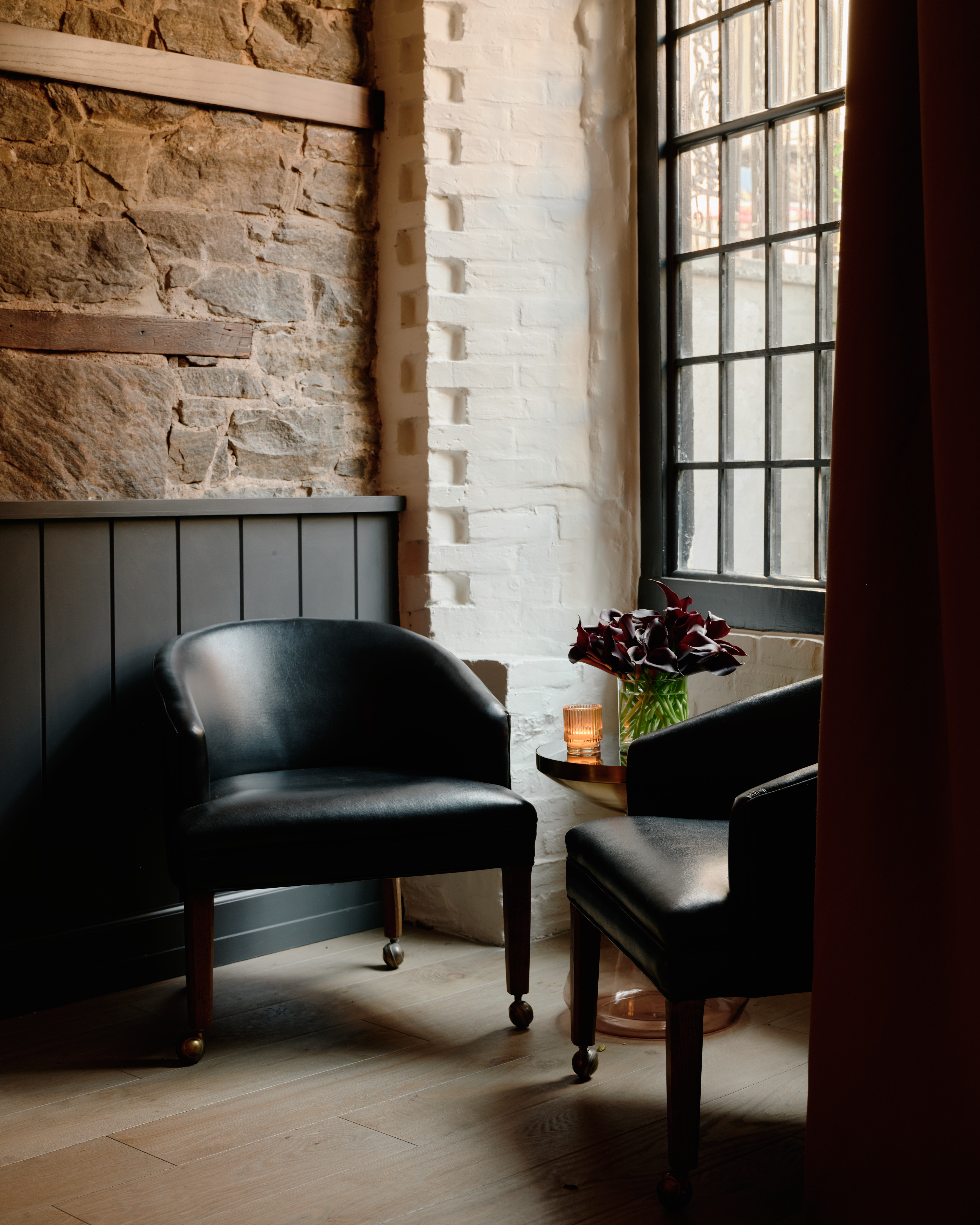 a chair sitting in front of a window