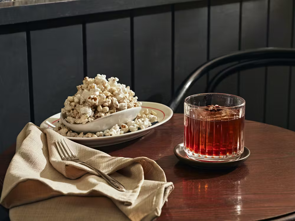 The Ghosts of Granata cocktail with popcorn