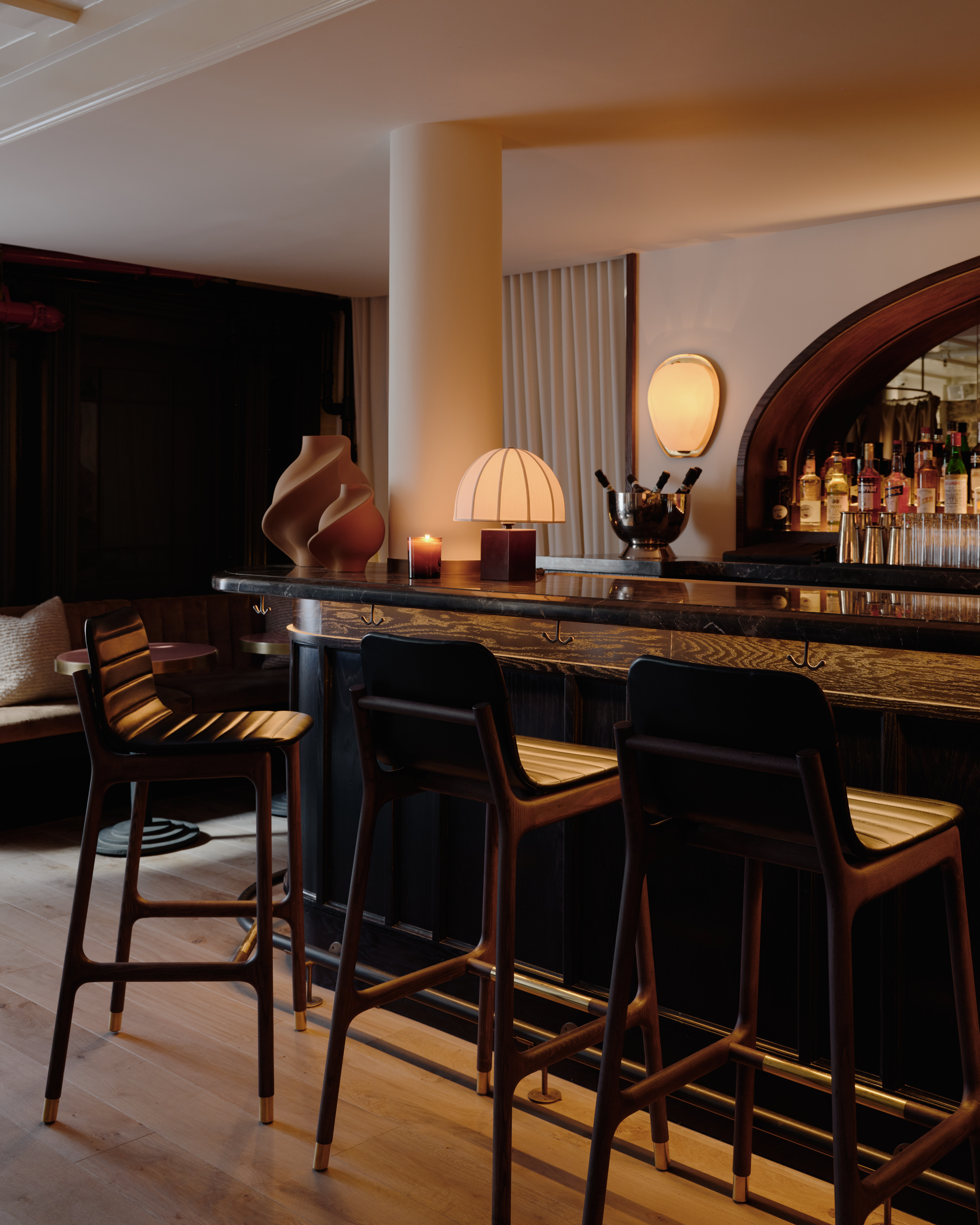 a room filled with furniture and a fireplace