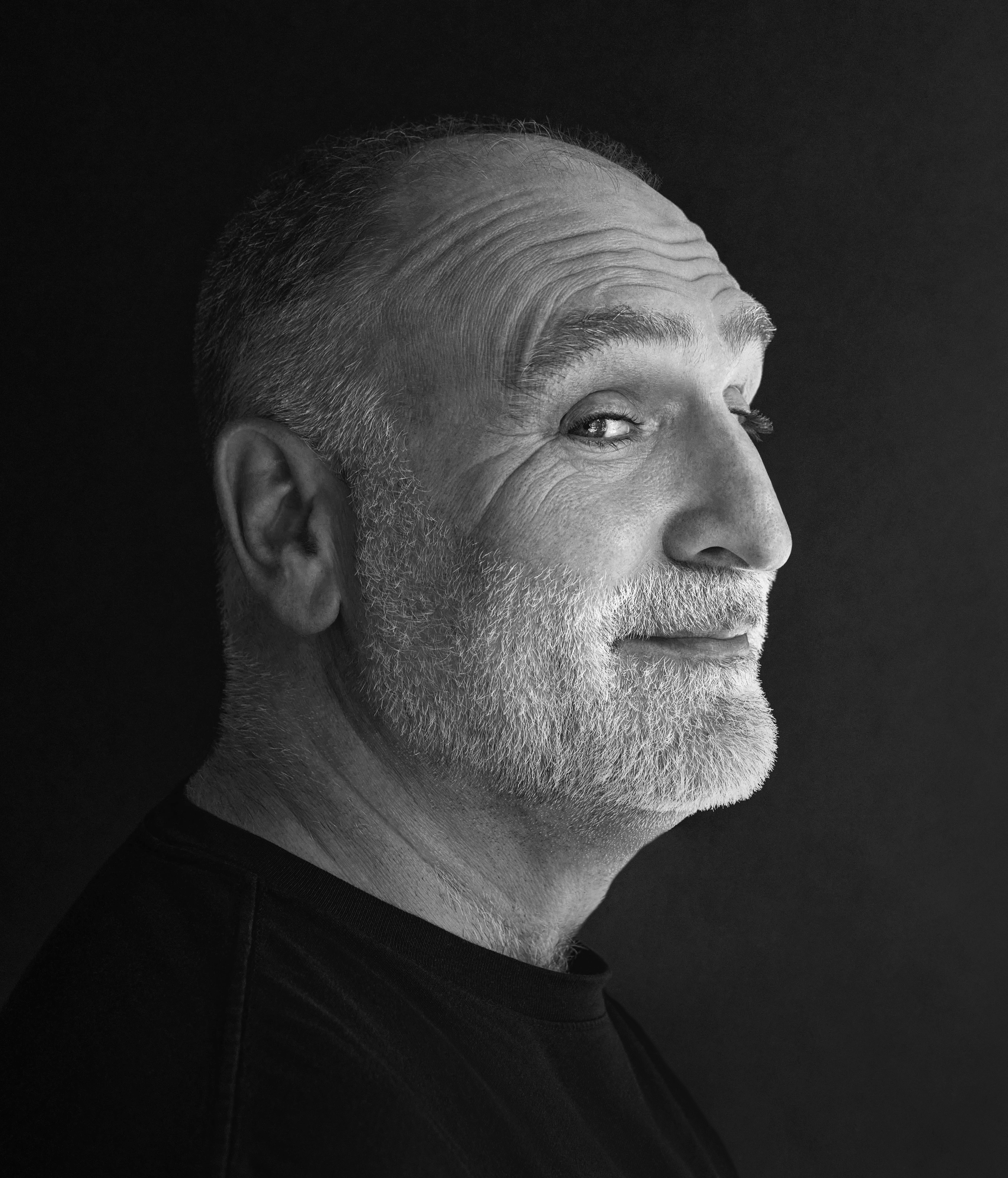 a man smiling at the camera.