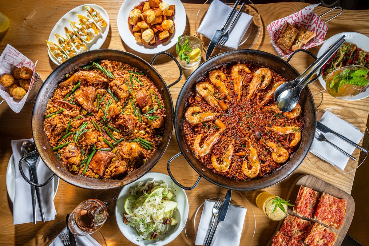 a table with paellas