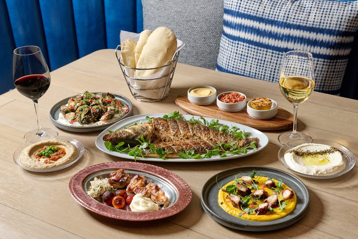 a table topped with different types of food on a plate